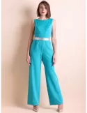 Casting Turquoise prom jumpsuit with silver belt