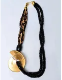 Black rhinestones and golden medal necklace